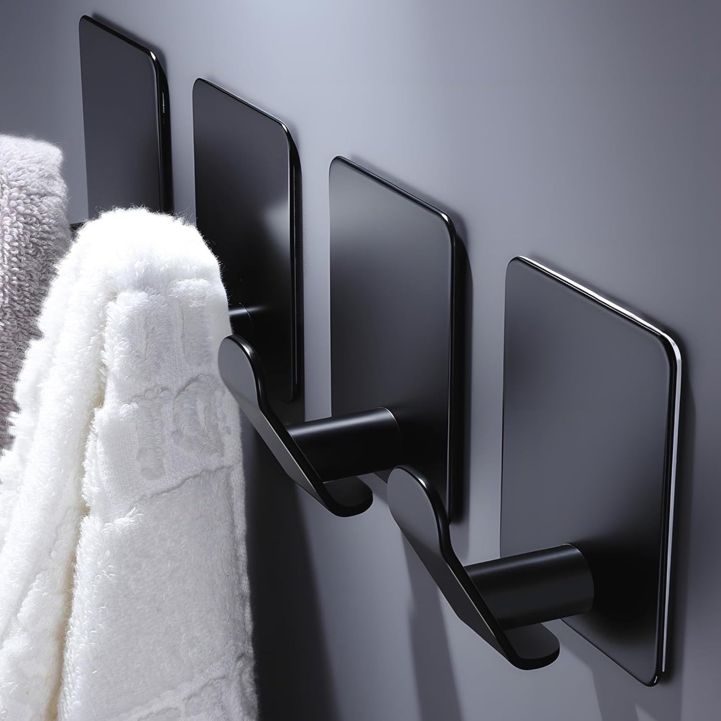 DELITON 4 Pack Adhesive Hooks - Towel Hook for Hanging Towels, Clothes and Bags, Matte Black Stainless Steel, Stick on Wall for Bathroom and Kitchen