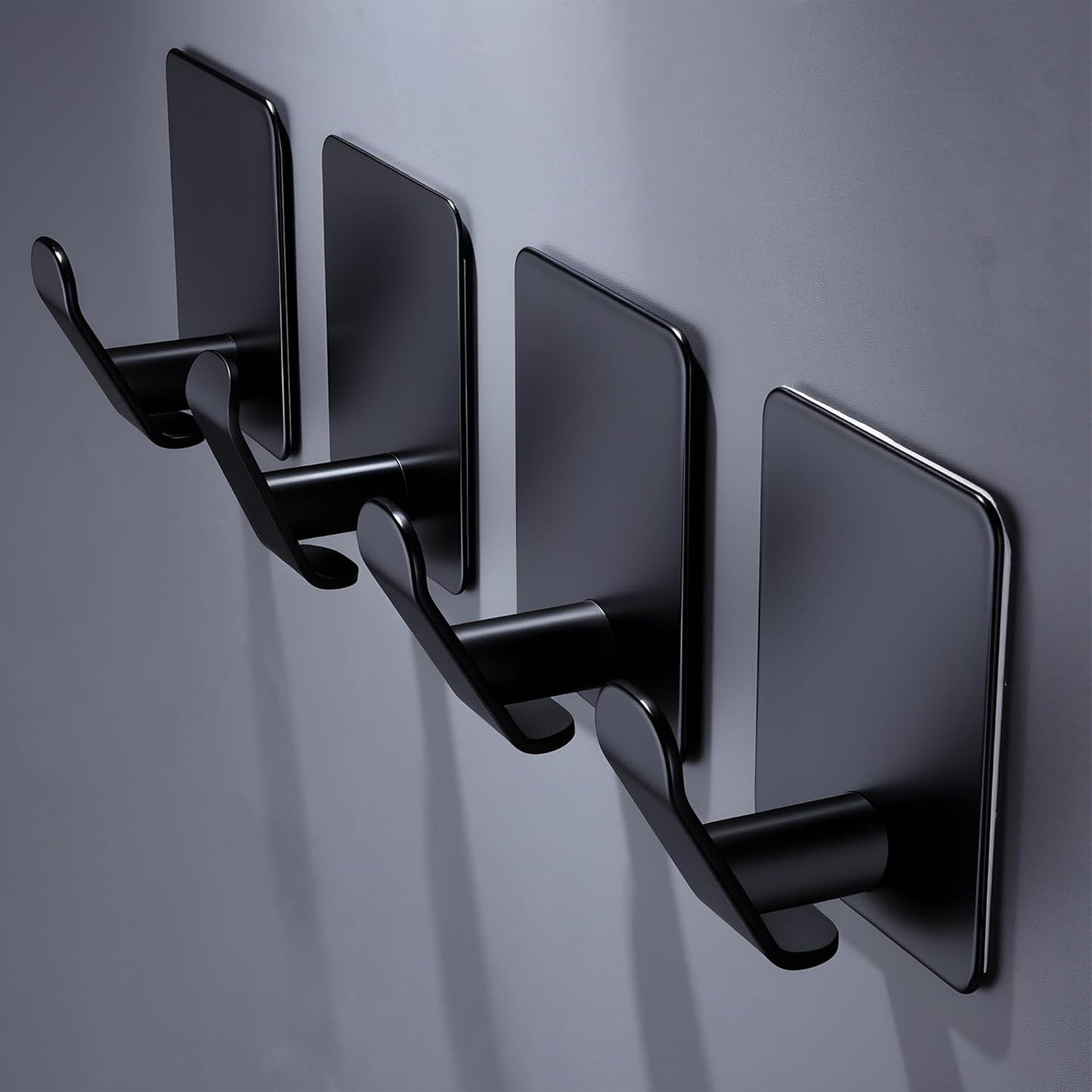 DELITON 4 Pack Adhesive Hooks - Towel Hook for Hanging Towels, Clothes and Bags, Matte Black Stainless Steel, Stick on Wall for Bathroom and Kitchen